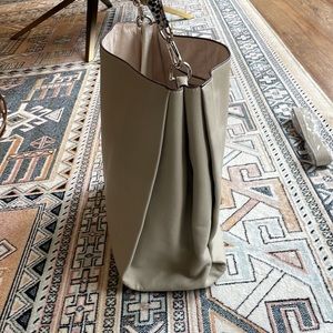 Light Gray Purse with leopard detail.